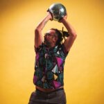 Takin in a yellow studio