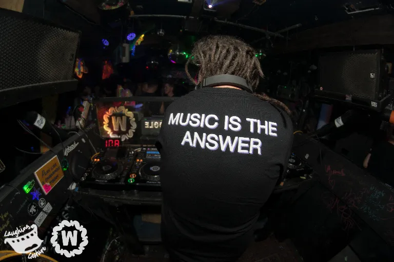 DJ with t-shirt saying Music is the answer